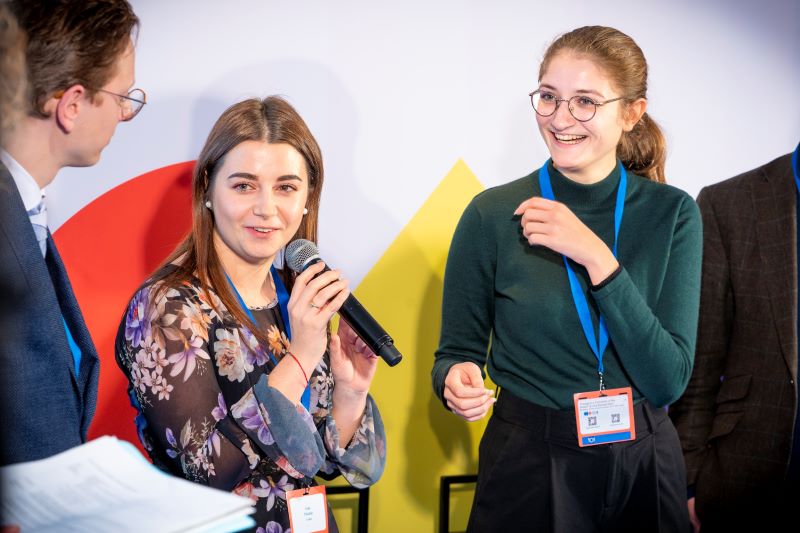 Students interacting at an event.